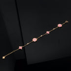 ??MIRA?¡¥STAR AND SUN 4 MOTIF PINK MOP PINK GOLD BRACELET